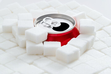 Cola can in pile of sugar cubes