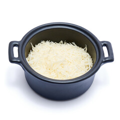 grated Parmesan cheese in black ceramic bowl isolated on white background
