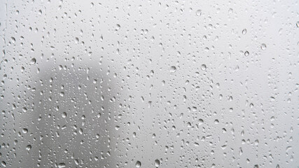 Look at the city through the raindrop window