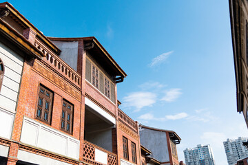 Chinese style houses and modern buildings