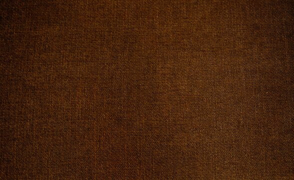 Braune Stofftextur als dunkler Hintergrund