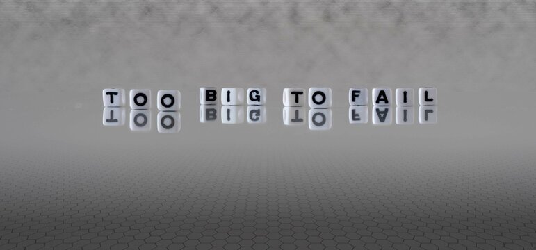 too big to fail word or concept represented by black and white letter cubes on a grey horizon background stretching to infinity