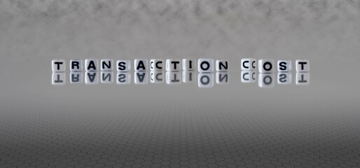 transaction cost word or concept represented by black and white letter cubes on a grey horizon background stretching to infinity