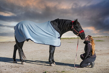  woman, horse and blanket