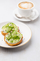 Keto Toasts with ricotta, egg, cucumber and black sesame.