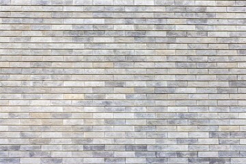 Natural stone color brick wall textured background 