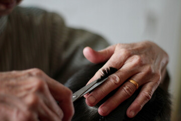 Obraz premium hairdresser with scissors 