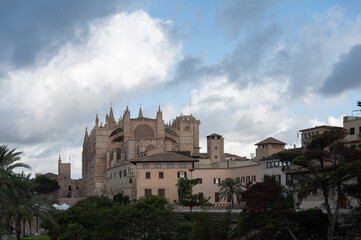 Fototapeta na wymiar Detail of the Cathedral Basilica of Santa Maria de Mallorca with cloudy sky