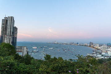 aerial view of pattaya beach and buildings at sunset - obrazy, fototapety, plakaty