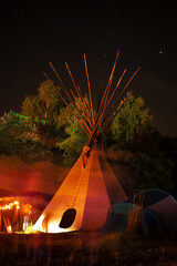 Wigwam indian tent in the night © Kasia Czampiel