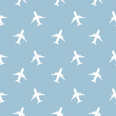 Kids seamless pattern with airplanes white. Blue background. Baby pattern.