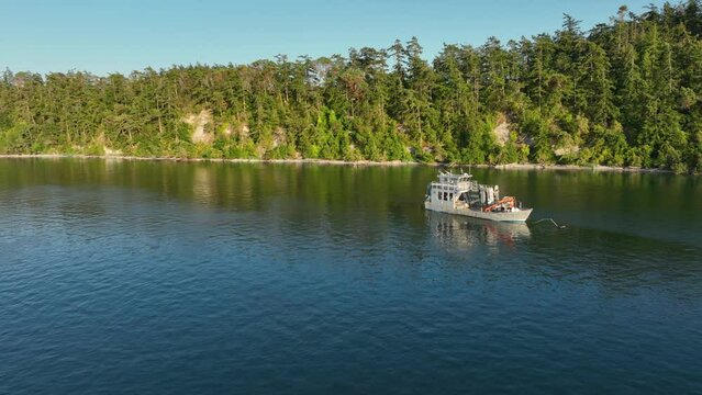 Aerial shot of a fisherman's seafaring boat anchored off near Coupeville, Washington.