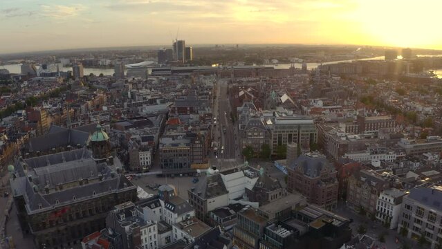 Drone shot over Damrak road towards Amsterdam Central station