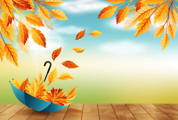 Autumn background with umbrella, flying fall leaves and blue sky - obrazy, fototapety, plakaty