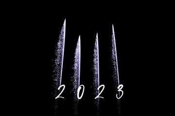 Happy new year 2023 purple fireworks rockets new years eve. Luxury firework event sky show turn of the year celebration. Holidays season party time. Premium entertainment nightlife background - 524008615