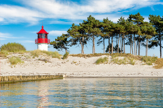Small lighthouse Gellen of Hiddensee Island Baltic coast. View from  sea side.
