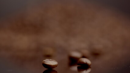 Pile coffee grains closeup background. Aromatic coffee harvest on dark backdrop.