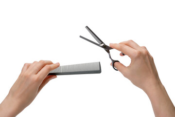 Women's hands hold a comb and thinning scissors. Professional setting of the hairdresser's hands, the position of readiness for the haircut process. Isolated on white background