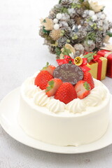 クリスマスケーキ　
クリスマスリースとプレゼントの背景