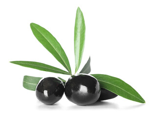 Delicious black olives with leaves on white background