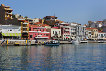 View from the sea on Bright colorful houses on the greece seashore