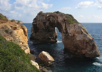 Famous rock arch, Es Pontàs, at the coast of Santanyi, Mallorca, Spain