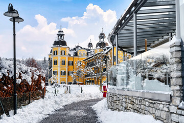 View of Schlosshotel Falkenstein in winter atmosphere. Velden on Lake Wörthersee, Austria