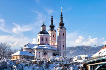 Villach, Austria. Idyllic view of the Church of the Holy Cross (Heiligenkreuzkirche ) in winter