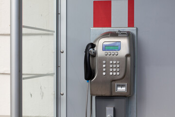 Urban phone booth, technology, communication.