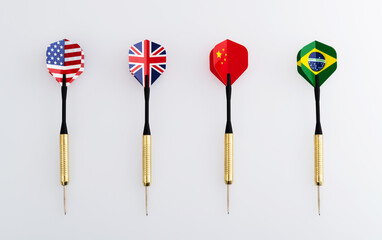 Four darts with different flags