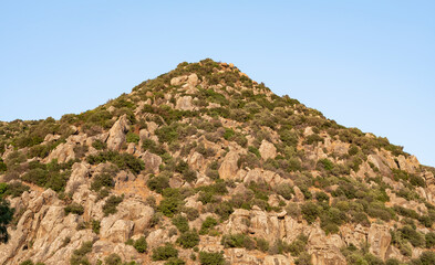 Fototapeta na wymiar aspat mountain background, front view