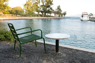 empty marble table in front of marina background, Aspat Marina, Bodrum, Turkey