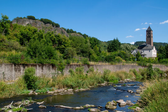 view of the evangelical church along the river Kyll in the city center of the touristic village of Gerolstein in the German Eifel