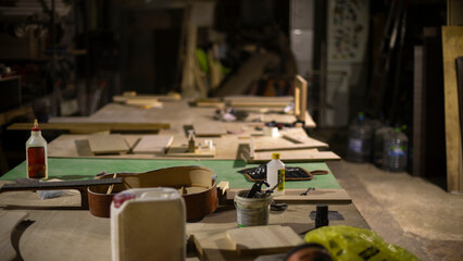 Carpentry workshop in detail. Interior of wood workshop. Items on table.