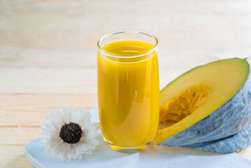 pumpkin juice on wooden, high beta-carotene