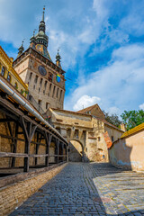 Obraz premium Sighisoara, Transylvania, Romania with famous medieval fortified city and the Clock Tower built by Saxons.