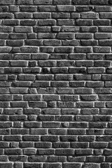 Bricks of an old building facade in Sauerland Germany. Uniform grid made by macons. Black and white...