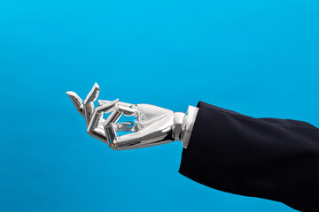 Robot hand on blue background