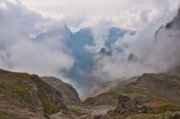 Crossing the Pale di San Martino in the clouds, Alta Via 2, Dolomites, Italy