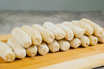 Raw tequeños ready to cook, typical Venezuelan snack at parties
