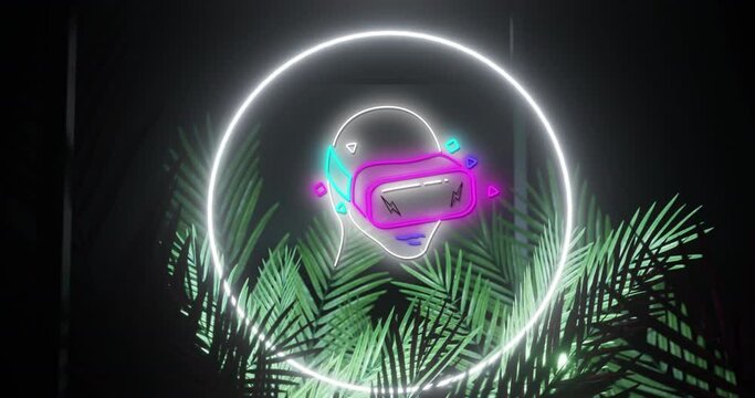 Animation of neon head in vr headset and ring in white neon, over palm leaves on black background