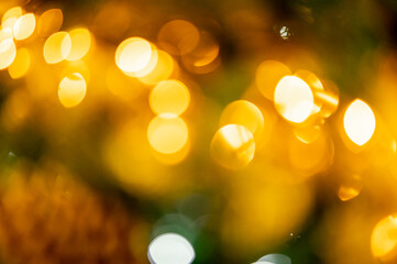 Twinkley Lights and Stars Christmas Background. christmas tree bokeh. Defocused Gold Lights. Christmas background bokeh.