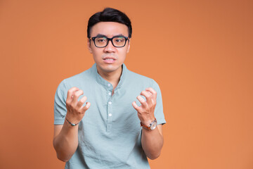 Photo of young Asian man on background