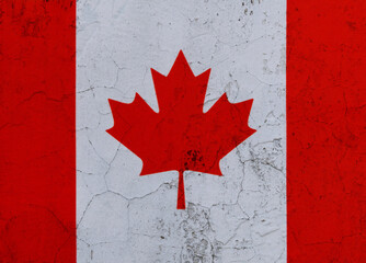Canadian flag on cracked wall