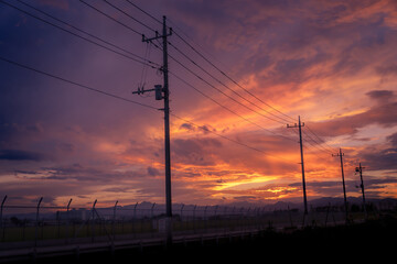 Sunset on blue sky. Blue sky with some clouds. Dramatic sky Golden sun beautiful background in Japan