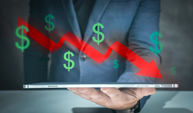 Businessman making decrease chart. Global financial crisis. Concept of economic downturn. Business concept of crisis and recession. red arrow going down surrounded by dollar sign