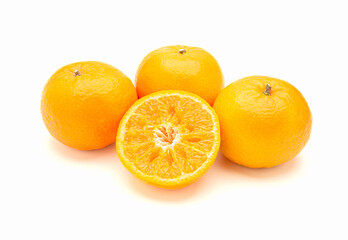 Pile of fresh oranges over a white background