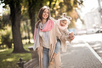 Fototapeta premium Mother with little daughter having fun together 