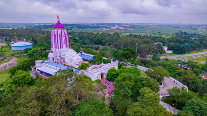 Beautiful aerial view of Jagannath Temple, The Jaganath temple is on top of a small hillock located...