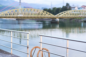 metallic bridge over river. 